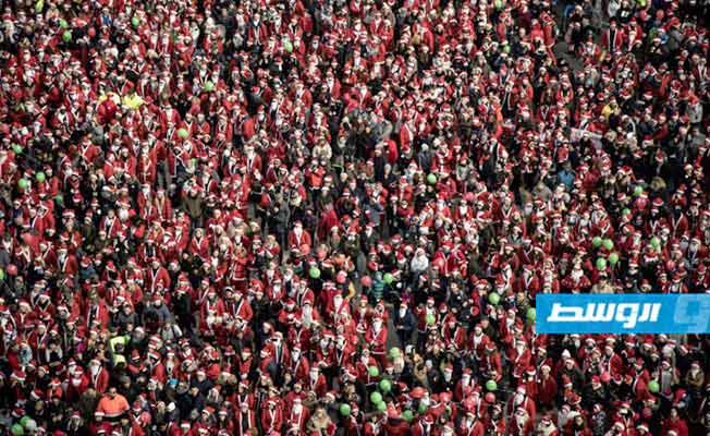 آلاف سانتا كلوز يشاركون في عمل خيري بإيطاليا