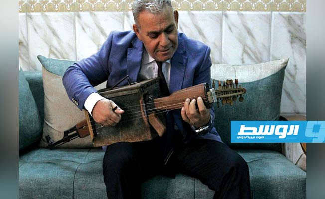 العزف على أوتار الكلاشينكوف في بغداد