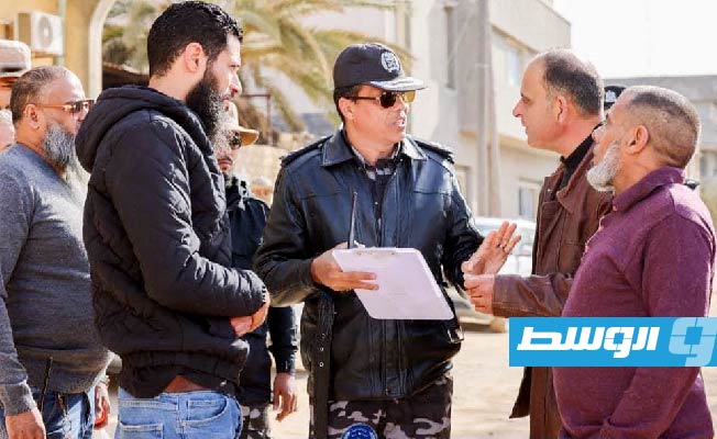 قوة أمنية تنفذ أمر النائب العام بوقف التعدي على أرض مواطنة في طرابلس، الثلاثاء 2 يناير 2024 (وزارة الداخلية)