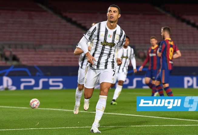 رونالدو يحتفل بالهدف الأول من ركلة جزاء ليفك بالتالي صياما لخمس مباريات عن التسجيل ضد برشلونة في دوري الأبطال. (الإنترنت)
