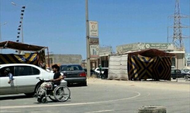 فتح طريق المطار ببنغازي بعد إغلاقها من جرحى الجيش