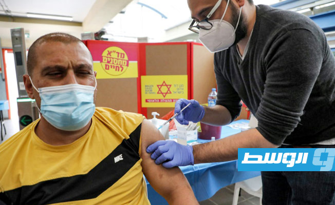 الحكومة الإسرائيلية تبدأ تطعيم العمال الفلسطينيين حملة التصاريح ضد كورونا