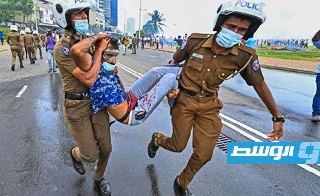 حظر تجول في عاصمة سريلانكا بعد صدامات خلفت 20 جريحا