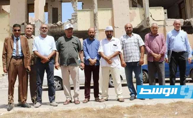 لجنة من مصرف ليبيا المركزي تعاين الأضرار التي لحقت بفرعه في سرت جراء الحرب على «داعش»، 16 أغسطس 2022. (بوابة الوسط)