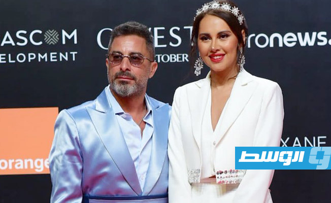 ياسمين رئيس وزوجها المخرج هادي الباجوري قبل عرض فيلمهما «قمر 14» (خاص لـ بوابة الوسط)