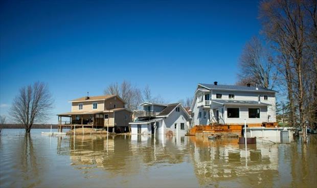 إجلاء الآلاف من مناطق قرب مونتريال في كندا إثر انهيار سد جراء فيضانات
