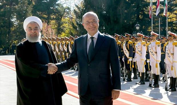 الرئيس العراقي يلتقي روحاني في أول زيارة رسمية له لإيران