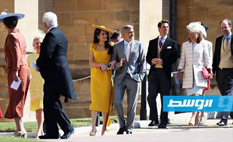 جورج كلوني و زوجته في الزفاف الملكي (فيسبوك)