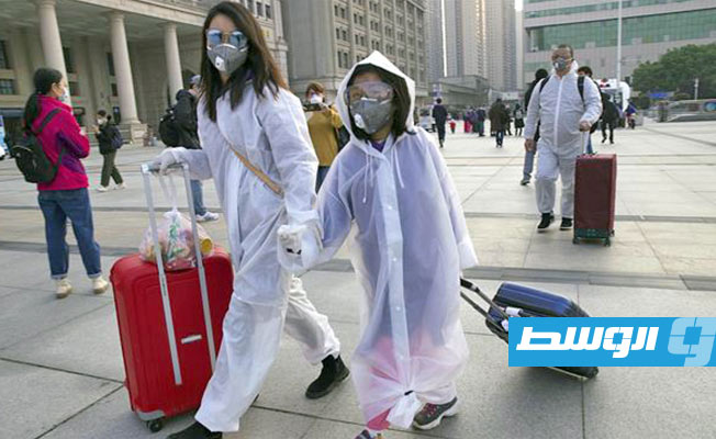 خبراء منظمة الصحة يخرجون من الحجر للتحقيق في مدينة ووهان الصينية