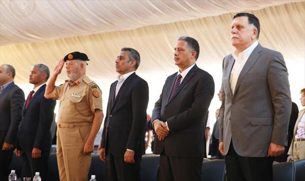 السلام الوطني خلال حفل إعطاء الإذن باستئناف العمل في مطار طرابلس الدولي. (الصفحة الرسمية للمجلس الرئاسي)