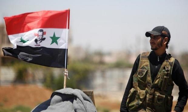 القوات السورية تدخل درعا وترفع العلم
