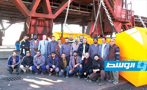 احتفالية في الشركة الليبية للحديد والصلب بمناسبة إعادة تشغيل مفرغ ومعبئ السفن في الميناء, 8 ديسمبر 2020. (صفحة الشركة على فيسبوك)