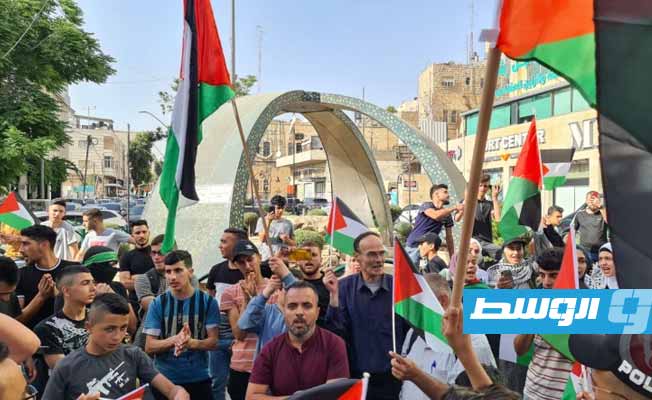 مسيرة أعلام فلسطينية تزامنا مع مسيرة المستوطنين في القدس. (الإنترنت)