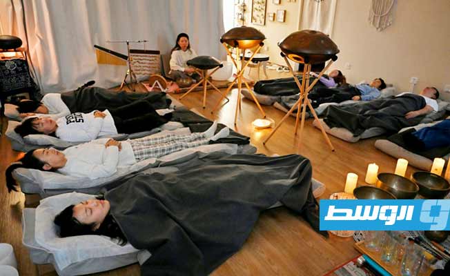 جلسات استرخاء على ضوء الشموع تساعد الشباب على النوم بشكل أفضل في الصين