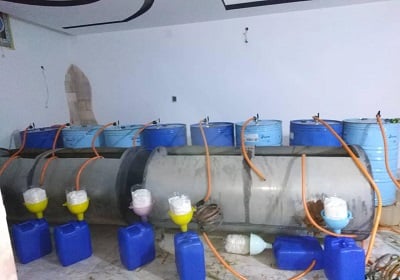 Interior Ministry: Liquor producing operation raided in Tajoura, 55,000 liters seized