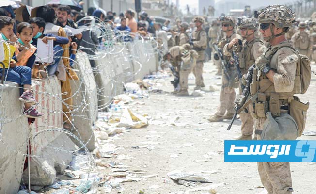 أفغان هاربون من كابل يعلقون بقاعدة أميركية في قطر ويترقبون مغادرتها