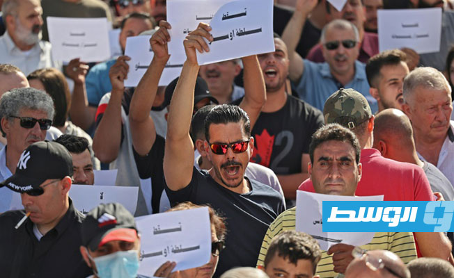 تظاهرتان معارضة ومؤيدة للرئيس الفلسطيني على خلفية وفاة الناشط نزار بنات