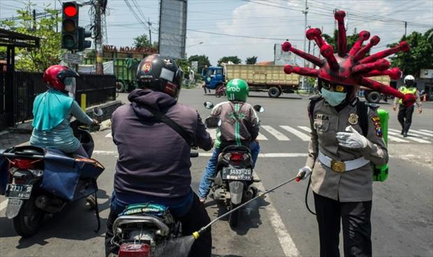 شرطة خاصة لمواكبة تشييع ضحايا «كورونا» في إندونيسيا