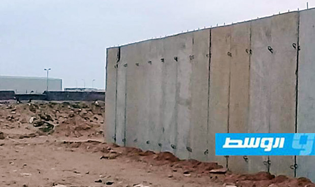 من أعمال بناء السور الحدودي بين ليبيا ومصر (مديرية أمن منفذ أمساعد البري)