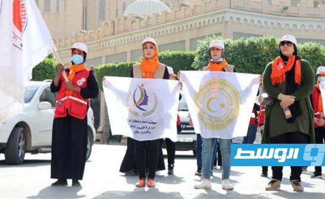 جانب من تظاهرة بمناسبة اليوم العالمي لمناهضة العنف ضد المرأة (صفحة مديرية أمن طرابلس على فيسبوك)