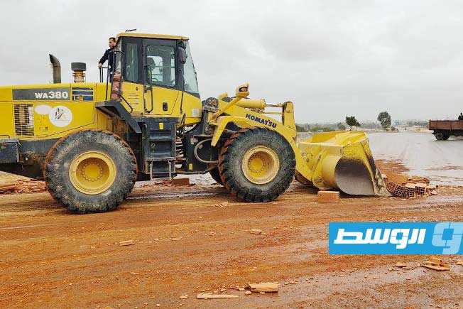 Truck loaded with clay bricks skids off Tripoli's Airport Road
