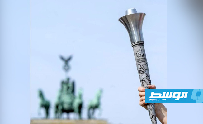 شعلة الأولمبياد الخاص للألعاب العالمية والذي تستضيفه العاصمة الألمانية برلين. (الإنترنت)