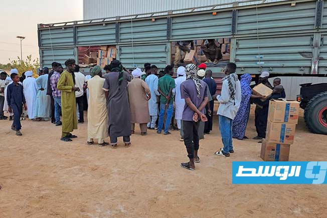 Distribution of food baskets to needy families and displaced persons from Sudan in Rebiana