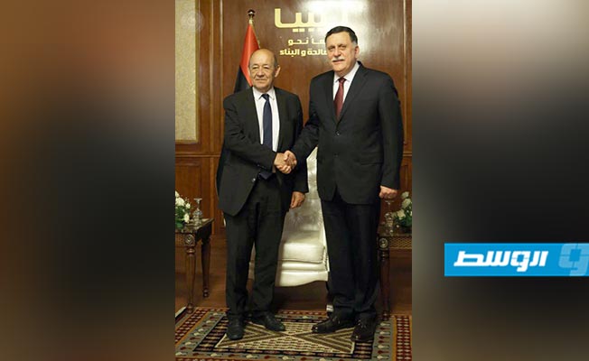 رئيس المجلس الرئاسي فائز السراج خلال استقباله وزير الخارجية الفرنسي في طرابلس، 23 يوليو 2018.