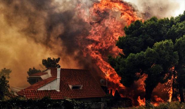 بالصور: ارتفاع ضحايا حرائق اليونان إلى 60 قتيلاً بينهم أطفال وجثث متفحمة
