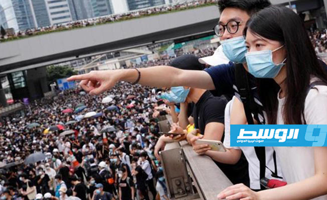 الآلاف يتظاهرون في هونغ كونغ ضد قانون تسليم المطلوبين للصين (فيديو)