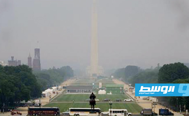 دخان الحرائق في كندا يغطي واشنطن دي سي، 7 يونيو 2023. (أ ف ب)