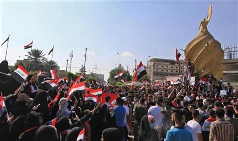 رئيس العراق يتعهد بإجراء انتخابات مبكرة.. والشارع يطلب المزيد
