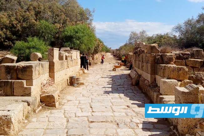 Tourists from Russia, China, and Ireland visit the ancient city of Leptis Magna