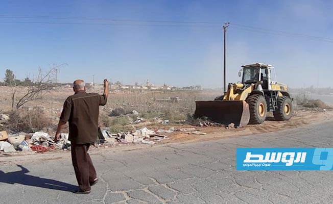 حملة لإزالة العشوائيات والمباني المخالفة بمنطقة طريق المطار في بني وليد