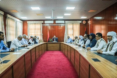رئيس الحكومة المكلفة من مجلس النواب يجتمع مع أعيان وحكماء خليج السدرة «بلدية بن جواد»، الخميس 13 أكتوبر 2022 (صفحة الحكومة على فيسبوك)