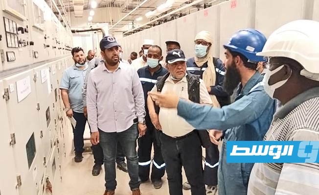 وفد الشركة العامة للكهرباء، يزور حقل الشرارة النفطي, 22 مايو 2021. (الشركة العامة للكهرباء)