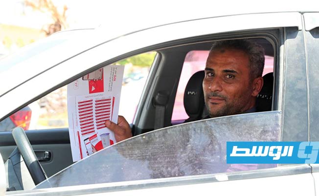 توزيع منشورات للتوعية بالمشاركة في الانتخابات المحلية بترهونة (اللجنة المركزية للانتخابات المحلية)