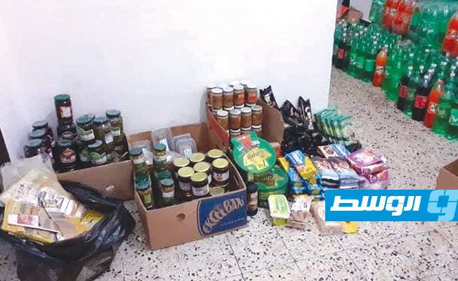 كميات من الأغذية منتهية الصلاحية المصادرة