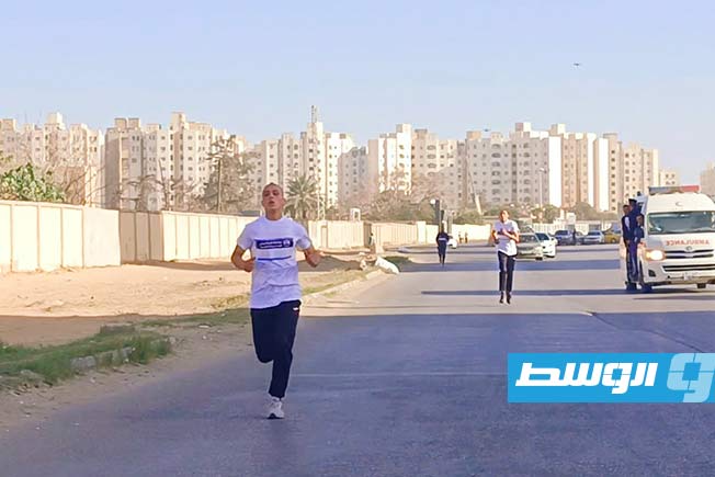 سباق العدو الريفي لاتحاد الشرطة بطريق المطار. (تصوير - محمد قجام)