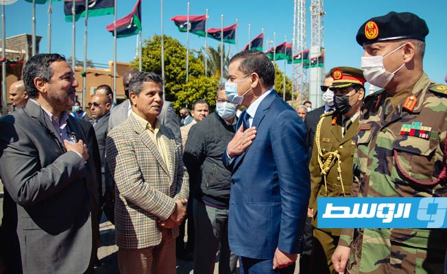 من استقبال الدبيبة في مطار معيتيقة الدولي، 11 مارس 2021. (صورة من بث مباشر)