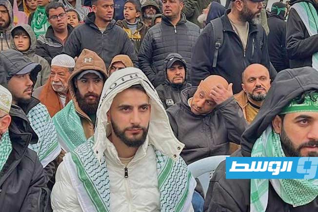 من مراسم تسليم جثامين الأسرى الإسرائيليين إلى الصليب الأحمر في خان يونس، 20 فبراير 2025. (الجزيرة)