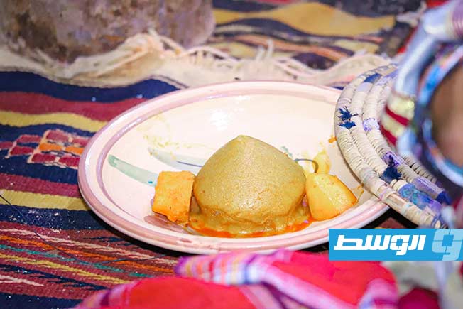 البازين يعد من أبرز العادات في أجواء الاحتفال بعيد الأضحى في بني وليد، الأربعاء 27 مايو 2026. (بوابة الوسط)