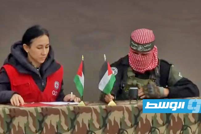 من مراسم تسليم جثامين الأسرى الإسرائيليين إلى الصليب الأحمر في خان يونس، 20 فبراير 2025. (الجزيرة)