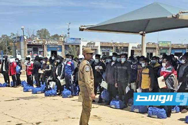 ترحيل مهاجرين غير قانونيين من مطار بنينا في بنغازي، 7 مايو 2026. (رئاسة جهاز مكافحة الهجرة غير الشرعية)