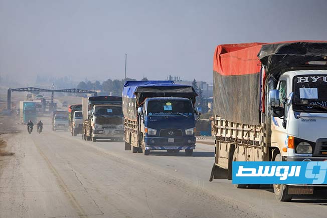 قافلة محمّلة بالمواد الطبية والإغاثية واللوجستية إلى منطقة عين العرب في ريف محافظة حلب. 25 يناير 2026. (سانا)