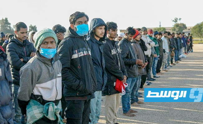 من عملية تسليم عدد من المهاجرين غير الشرعيين إلى جهاز مكافحة الهجرة غير الشرعية، 8 يناير 2022. (اللواء 128 المعزز)