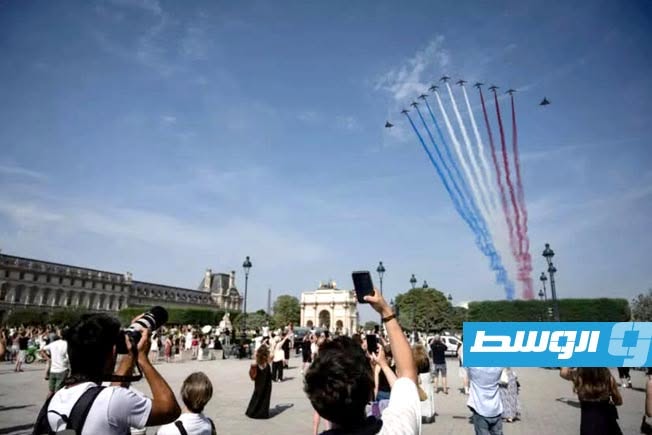 فريق الاستعراض الجوي النخبوي الفرنسي «باتروي دو فرانس» أثناء تحليقه في العرض العسكري السنوي. باريس، 14 يوليو 2026. (أ ف ب)