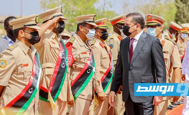 الدبيبة خلال مراسم تخريج الدفعة السادسة عشر بكلية القيادة والأركان، 23 أغسطس 2021. (حكومة الوحدة الوطنية)