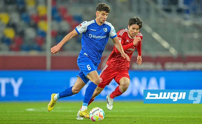 اللاعب الليبي دانيال الفاضلي خلال مباراة مع فريقه ماغديبورغ الألماني (الموقع الرسمي للنادي)