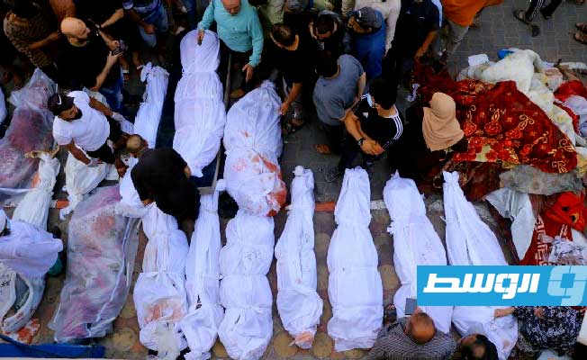 شهداء داخل أكفانهم جراء مجزرة الاحتلال الإسرائيلي في مخيم جباليا. (الإنترنت)